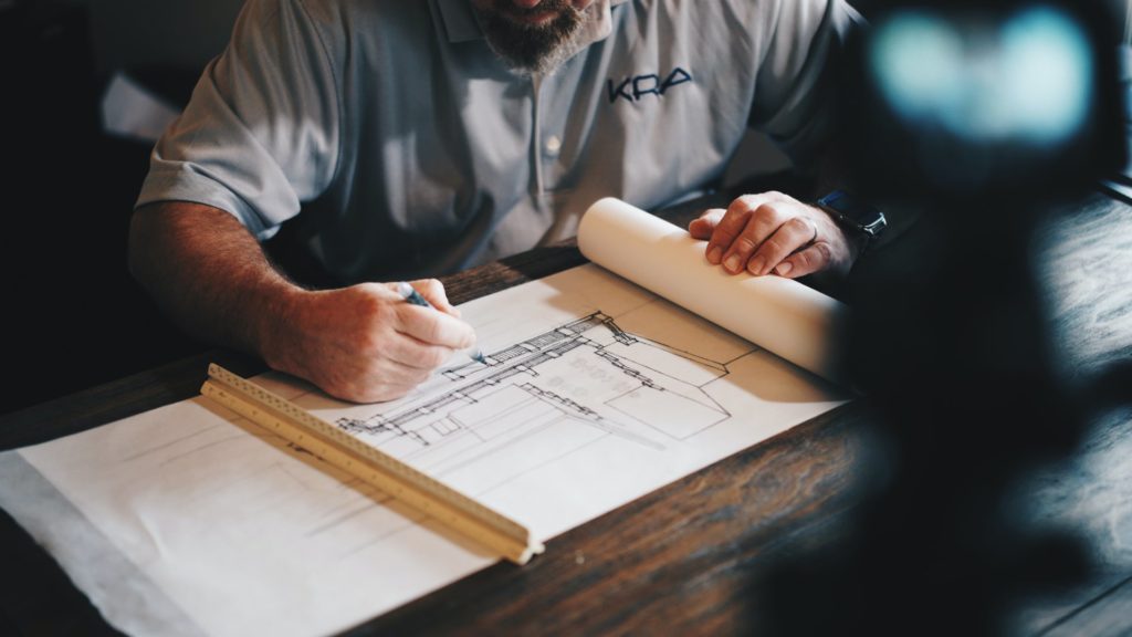 Architect drafting plans