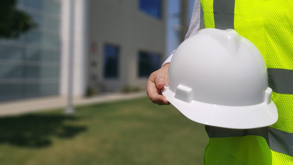 Man holding hard hat